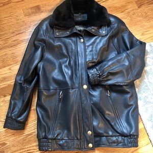 “The IT jacket”!  Ladies black leather jacket detach fur vest & colar